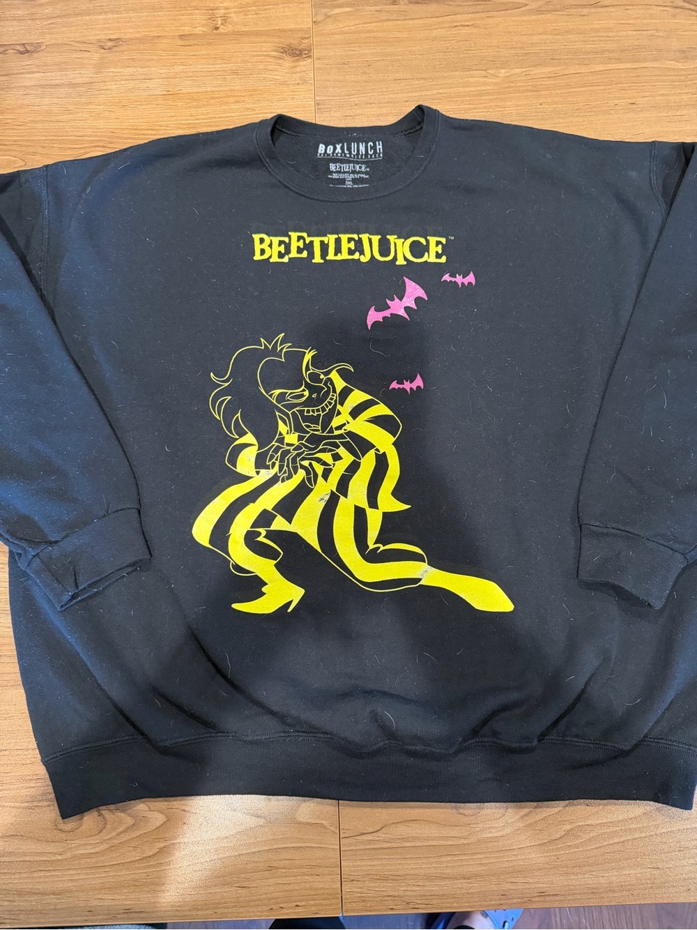BoxLunch Beetlejuice Graphic Crewneck Sweatshirt - Black with Yellow & Pink
